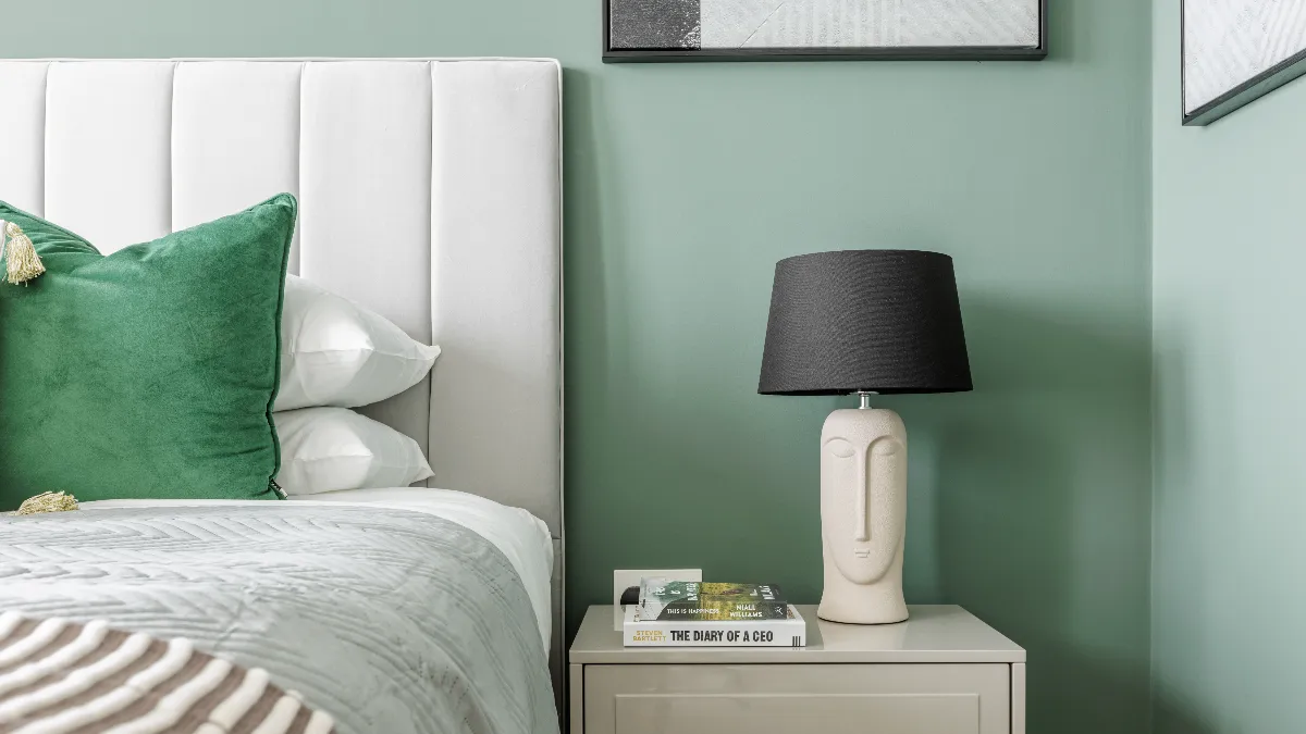 Bed and Stylish Lamp